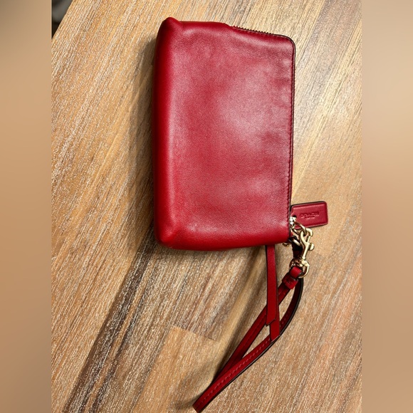 Coach burgundy wallet with gold accents. Wrist strap. Never used. - Picture 3 of 5